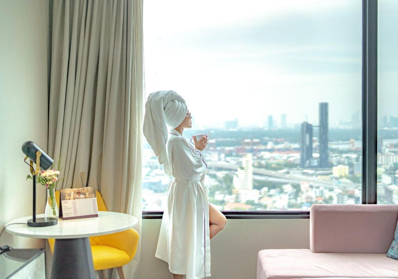 Avani Sukhumvit Bangkok Hotel Exteriér fotografie A woman wearing a bathrobe